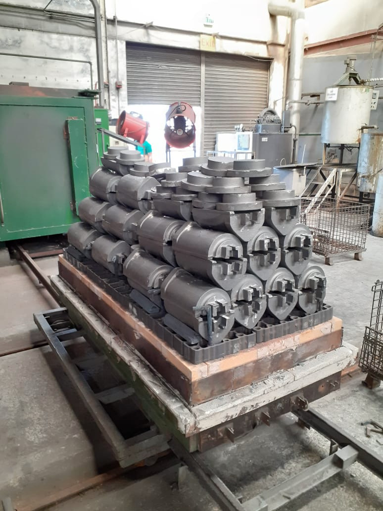 Glass molds on annealing cart, METERCOR