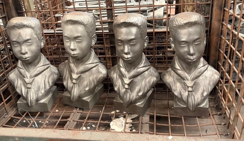 Scout Delgado: four stainless steel portrait busts of a boy in a scout's neckerchief, as cast by ceramic shell at Metercor, September 2026