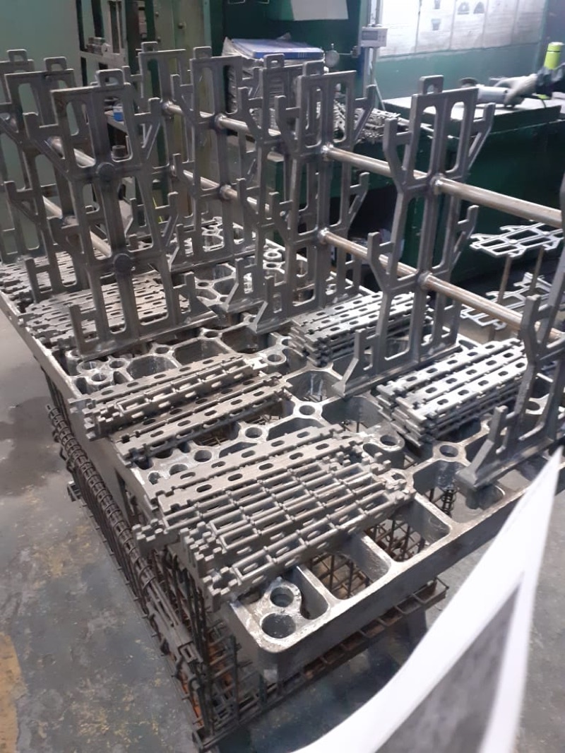 Cast stainless heat-treatment fixtures, posts and trays, ready for delivery