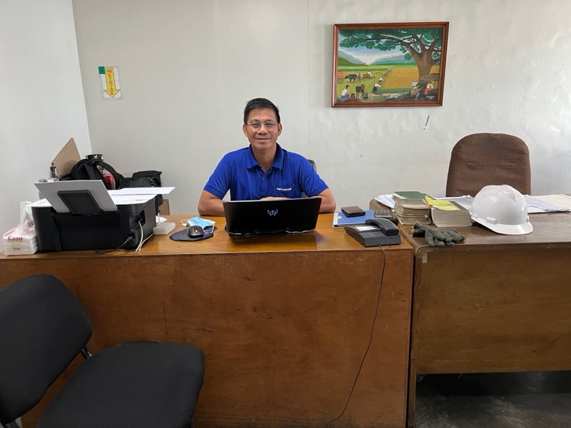 Val Araos at his desk in the Metercor office